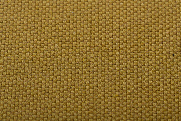 Golden yellow fabric texture close-up for background or design element