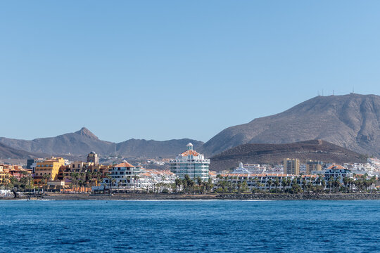 Hotels, resorts, beaches on South of Tenerife in Costa Adeje and Playa de las Americas, Canary islands, Spain in winter, view from ocean