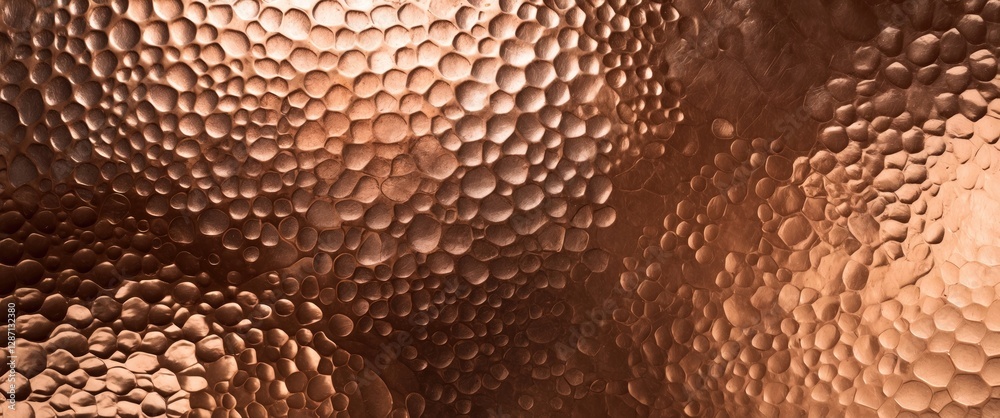 Poster Textured copper plate surface with unique patterns and reflections suitable for backgrounds and design elements in various projects.