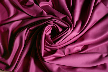 Texture, background, pattern. Texture of pink fabric. Casual elastic material calls neoprene, variable usage, easy to work with. Top view