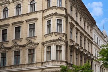 old apartment building with ornate decorations around window frame