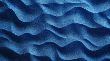Obraz premium Blue Textured Surface with Undulating Waves