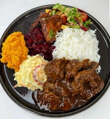 Food is any substance consumed to provide nutritional support for the body. It typically comes from plants, animals, or fungi and contains essential nutrients such as carbohydrates, proteins, fats, vi