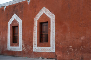 Close up on orange Mexican windows