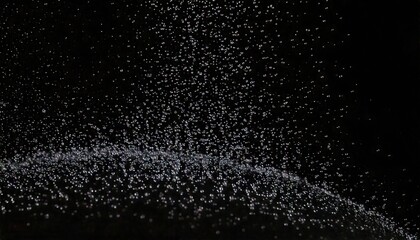 Obraz premium Close up shot of water particles isolated on a black background