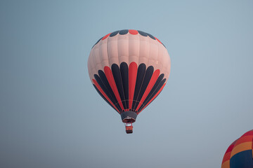 Hot-air Balloon in the sky at sunset