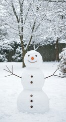 Fototapeta premium Smiling snowman in winter wonderland with freshly fallen snow in a forested park