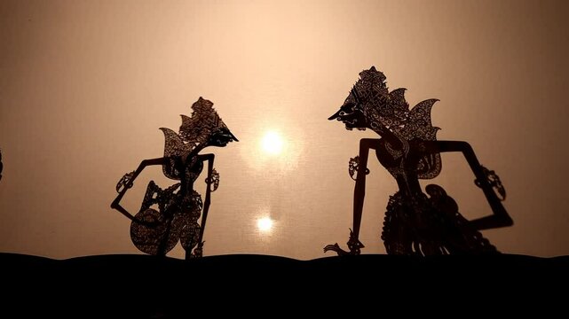 An entrance scene in a Wayang Kulit performance, a traditional Javanese shadow puppet show in Indonesia