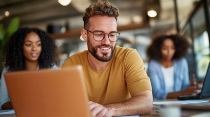 Team of business experts engaged in a collaborative laptop presentation