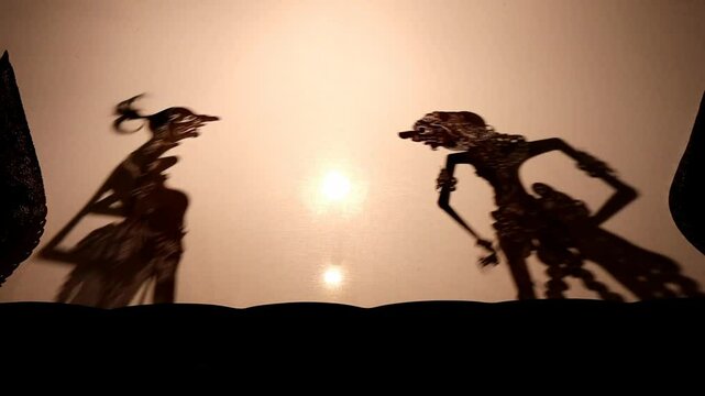 A battle scene in a Wayang Kulit performance a traditional Javanese shadow puppet show in Indonesia