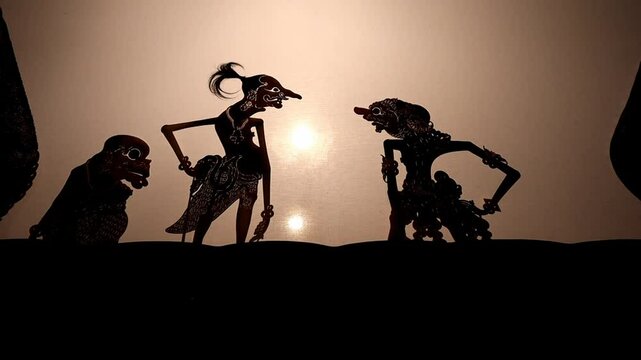 A battle scene in a Wayang Kulit performance a traditional Javanese shadow puppet show in Indonesia