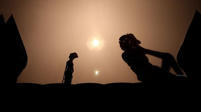 A dancing scene in a Wayang Kulit performance a traditional Javanese shadow puppet show in Indonesia