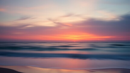 Obraz premium Blurred seascape at sunset, vibrant orange and pink sky, long exposure ocean waves, tranquil beach scene, pastel colors, dreamy atmosphere, soft focus, serene horizon, ethereal coastal landscape, peac
