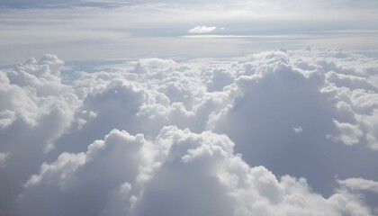 sunshine pouring down onto grey clouds and grey sky