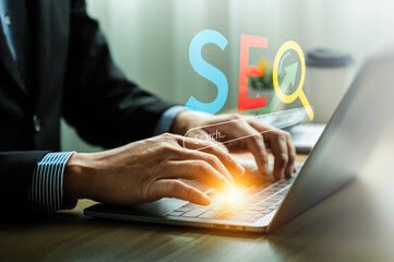 Professional working on SEO optimization with a laptop, utilizing a search engine interface and...