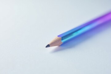 Obraz premium A vibrant iridescent pencil rests on a pristine white surface, ready for creative expression and innovative ideas.