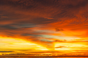 Obraz premium Amazing colorful clouds in sunset or sunrise sky over sea nature landscape background