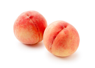 Peaches placed on a white background.