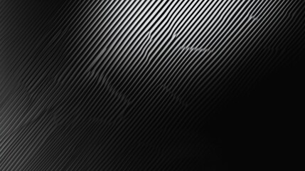 Artistic photography capturing grainy black textures with subtle gradients in dimly lit environments