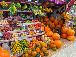 Colombian Market Stall with Pumpkins and Fresh Produce

