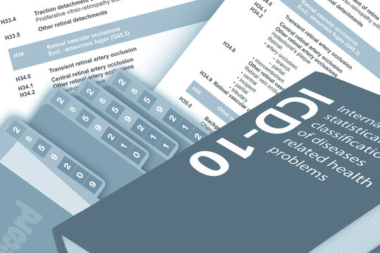 Medical record floder, document and desease classification code book for background.