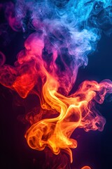 Fototapeta premium Abstract smoke art with vibrant colors and dynamic movement on a dark background creating a mesmerizing and ethereal visual experience