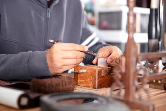 Artisans are carving traditional seals