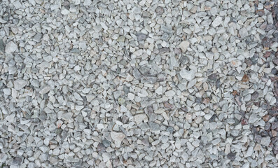 Top View of Uniformly Arranged Gray Small Stones for Background Texture