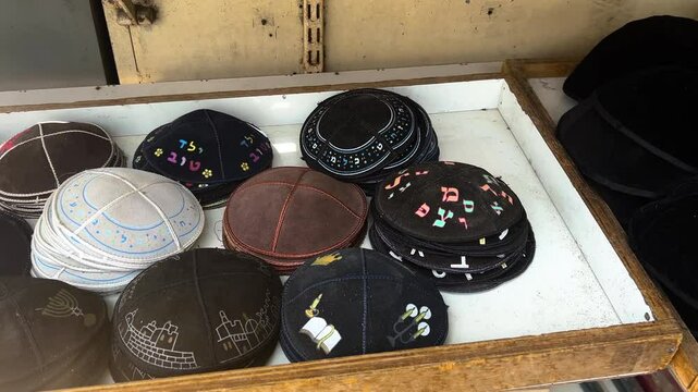 Jerusalem Old City Market, A stall selling a kippah, a Jewish religious cap. A kippah with a Star of David - a symbol of Israel