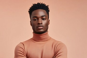 Obraz premium A handsome man poses for a portrait with a serious expression