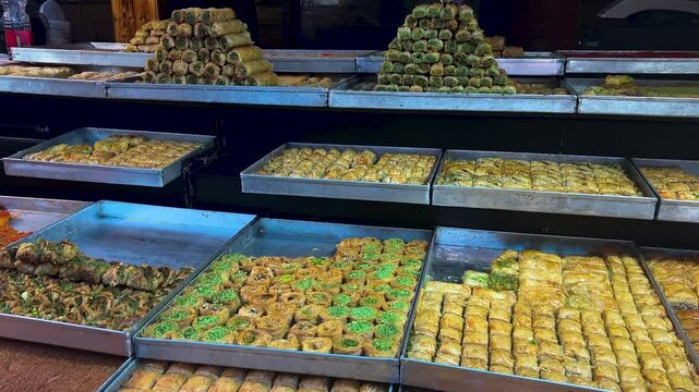 Baklava, an Arabic dessert made from syrup and honey. Baklava with pistachios close-up