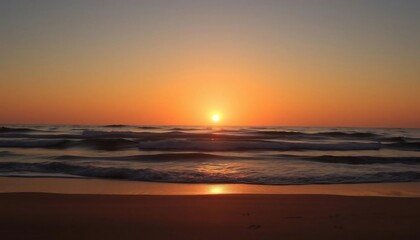 Obraz premium Golden Sunrise Over the Ocean Beach