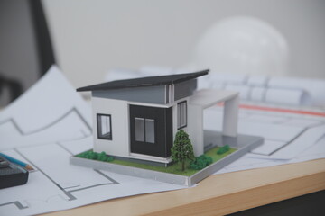 Architects, engineers, contractors working in the office with blueprints, inspection engineers Work analysis for architectural plan, construction project sketch, focus, business construction concept.