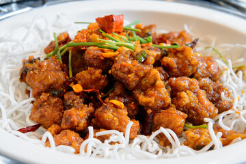 Fried chicken in spicy sauce