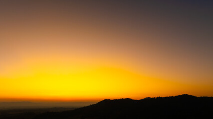 Enjoy a panoramic view of the skyline. The sun rises in the morning sky with colorful clouds. and beautiful cloud patterns In the soft light of the morning	
