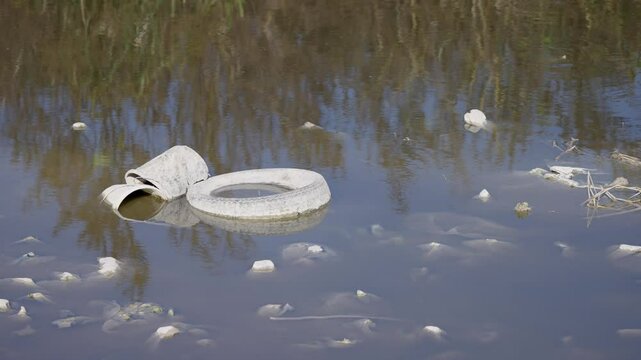 polluted water with garbage and waste