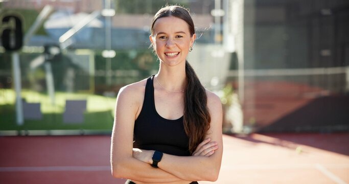 Happy woman, portrait with confidence for tennis, sport or competitive match. Face, African athlere or player with smile or arms crossed for fitness, game or padel competition on court or turf