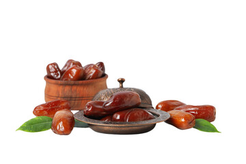 Dried dates in bronze and wooden bowls, close up, isolated on white background, PNG