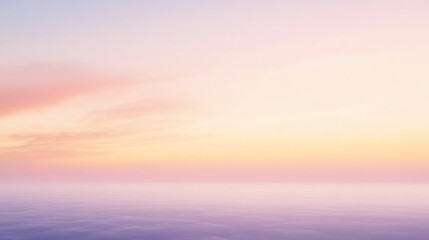 A serene seascape at dawn, showcasing soft pastel colors blending in the sky above calm waters, evoking tranquility and peace.