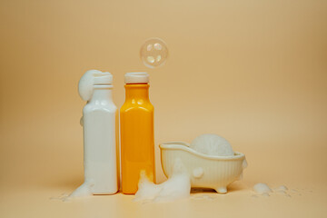 Shampoo and hair conditioner on a beige background. Foam and soap bubbles. Space for text. Advertising banner, mockup