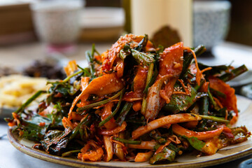 raw gizzard shad salad seasoned with spicy sauce and vegetables