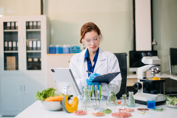 Scientist analyzing food samples in modern lab with advanced equipment for safety, nutrition, and biotechnology research.