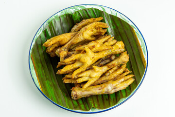 Fried chicken feet (Indonesian called ceker or cakar) with white background