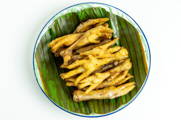 Fried chicken feet (Indonesian called ceker or cakar) with white background