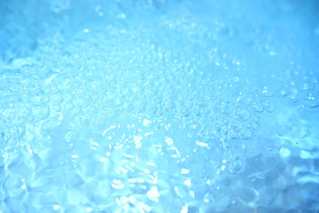 Obraz premium Blue water texture. Bubbles and bubbling water.