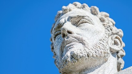 Fototapeta premium Ancient Marble Bust of Man against Clear Sky