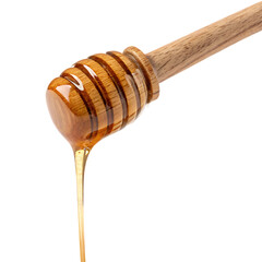 Honey dripping from wooden dipper isolated on transparent background