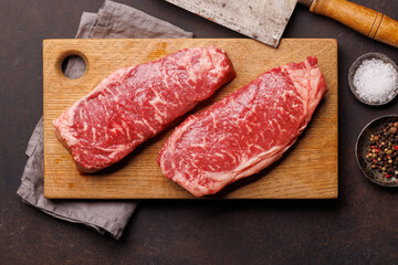Raw marbled striploin steak, fresh, rich, ready for cooking