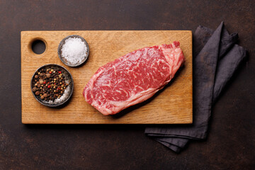 Raw marbled striploin steak, fresh, rich, ready for cooking