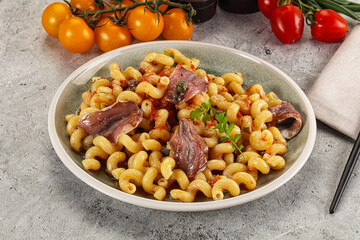 Italian pasta cellentani with anchovy